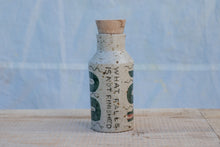 Load image into Gallery viewer, Yr hyn a gwymp, nid yw'n orffenedig: Potel Rym a Biceri / What Falls Is Not Finished: Rum bottle and Beakers